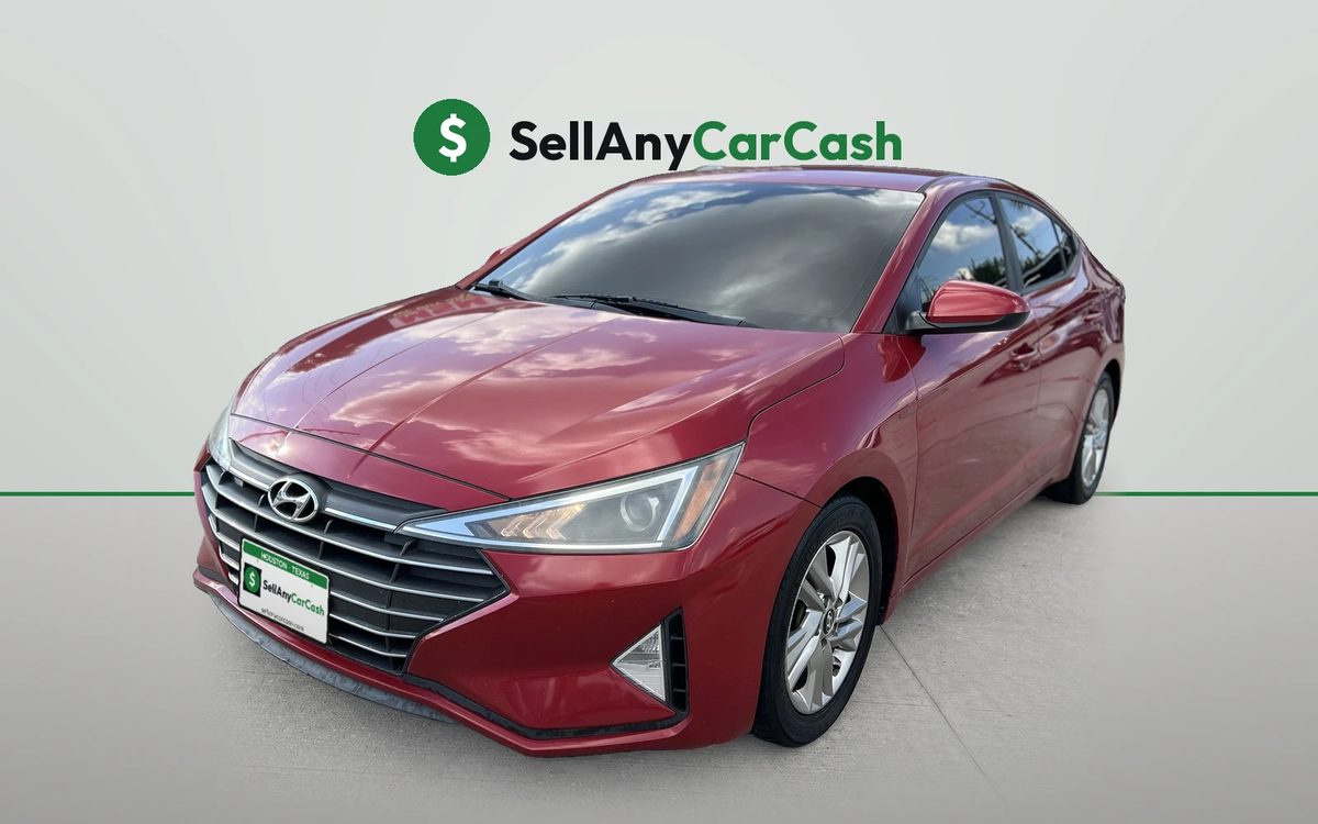 Red Hyundai Elantra we bought for cash in Houston, TX — Sell Any Car Cash