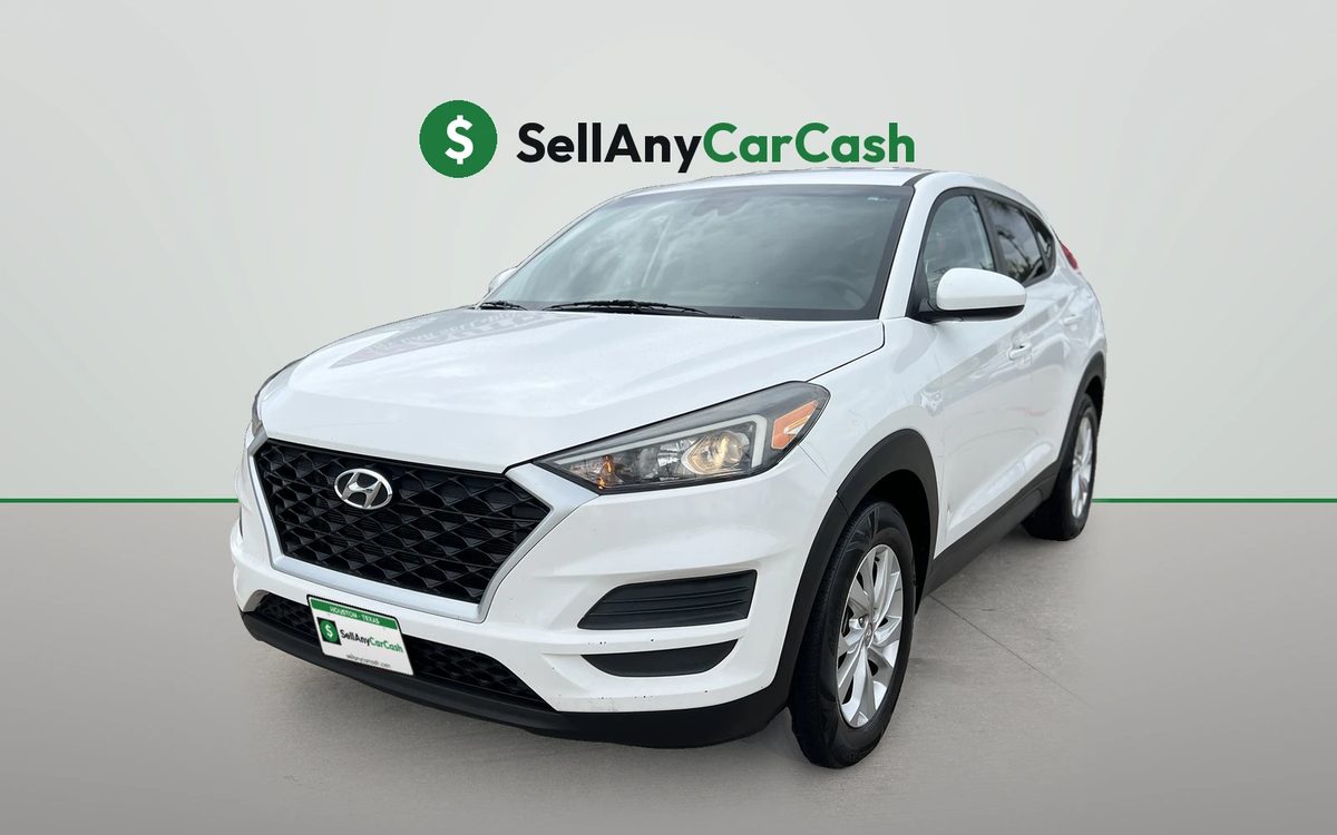 White Hyundai Tucson we bought for cash in Houston, TX — Sell Any Car Cash