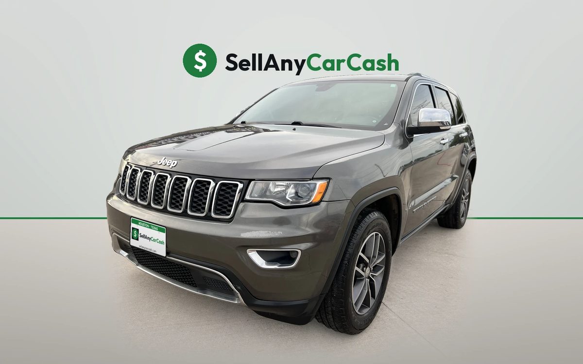 Gray Jeep Grand Cherokee we bought for cash in Houston, TX — Sell Any Car Cash