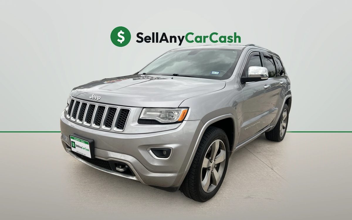 Silver Jeep Grand Cherokee Overland we bought for cash in Houston, TX — Sell Any Car Cash