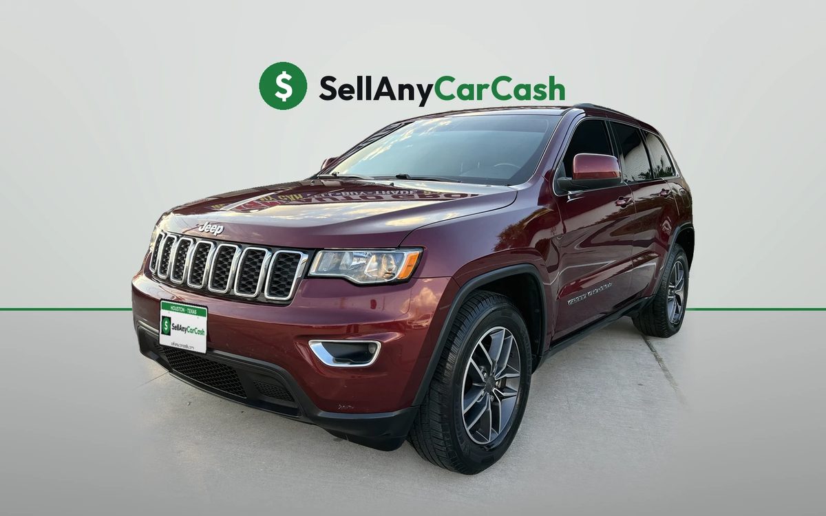 Red Jeep Grand Cherokee we bought for cash in Houston, TX — Sell Any Car Cash