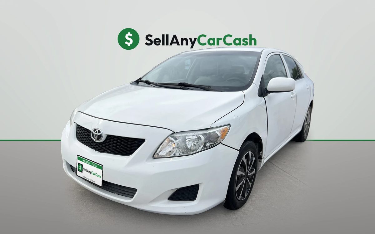 White Toyota Corolla we bought for cash in Houston, TX — Sell Any Car Cash
