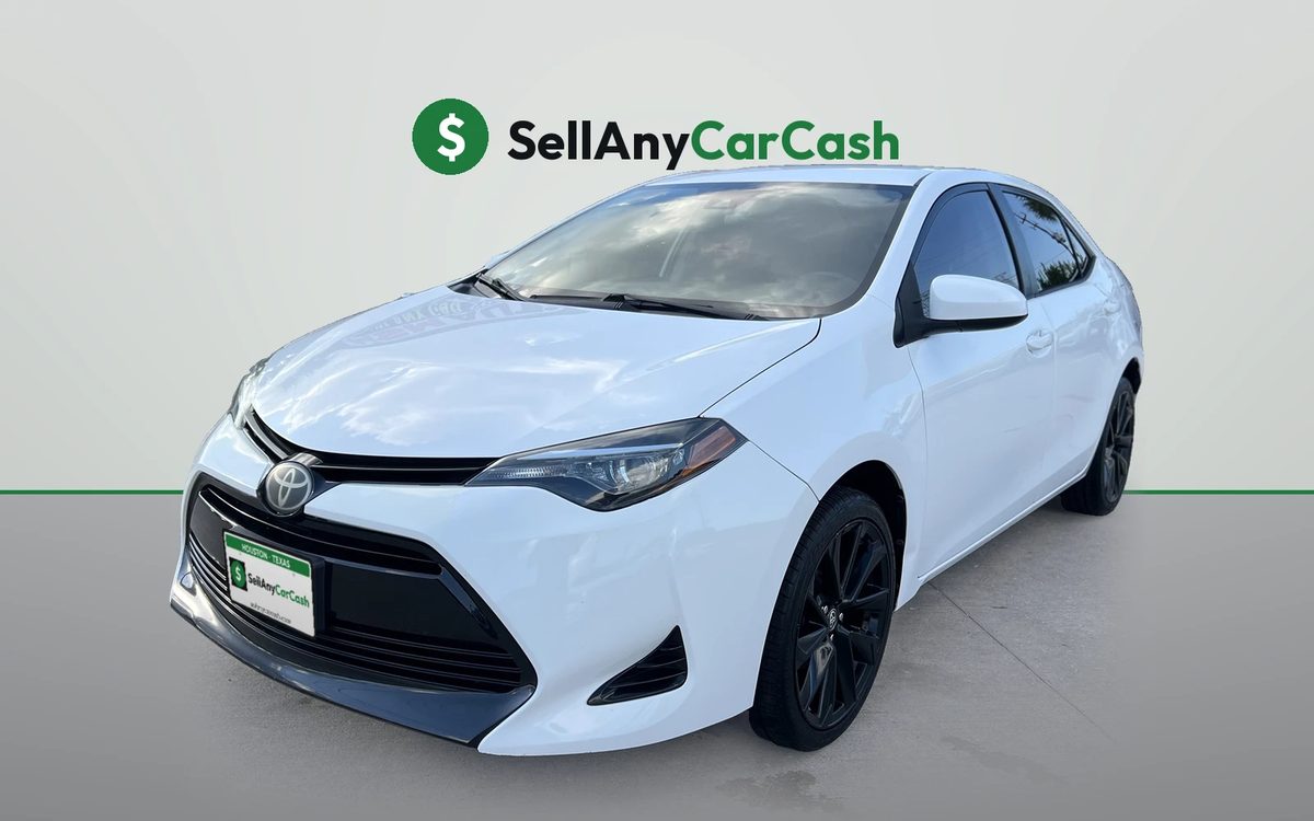 White Toyota Corolla we bought for cash in Houston, TX — Sell Any Car Cash